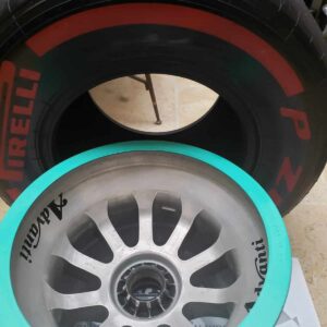 NOW SOLD-Lewis Hamilton 2014 World Championship winning rear wheel with rare red pirelli tyre from the Lewis Hamilton store collection.