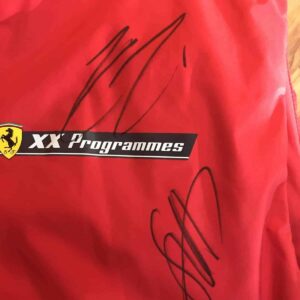 Sebastian Vettel and Kimi Raikkonen Signed Vest from the Sports Car Racing Signed store collection.