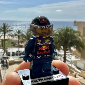 Max Verstappen with helmet blue gold world champion F1 formula 1 F1 grand prix pilota figura driver Super suit and super helmet in minifigure from the Sports Car Racing Race Gloves store collection.