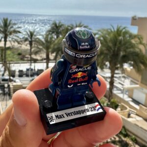 Max Verstappen gp Miami world champion F1 formula 1 F1 grand prix pilota figura driver Super suit and super helmet in minifigure from the Sports Car Racing Race Suits store collection.