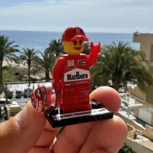 Michael Schumacher Ferrari world Champion F1 formula 1 F1 grand prix pilota figura driver Super suit and super helmet in minifigure from the Sports Car Racing Race Suits store collection.