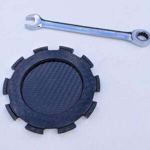 Lotus F1 carbon fibre clutch plate drinks coffee beer coaster Formula 1 office desk accessory racing gift from the Sports Car Racing Car Parts store collection.