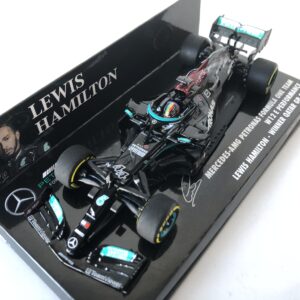 2021 Lewis Hamilton | Mercedes AMG Petronas W12 E Performance | Minichamps Diecast 1:43 | Winner Qatar GP from the Coffee Table Car Magazines store collection.