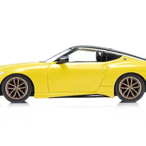 Nissan Fairlady Z RHD (Right Hand Drive) Ikazuchi Yellow with Black Top with Mini Book No.13 1/64 Diecast Model Car by Kyosho from the Sports Car Racing Books store collection.